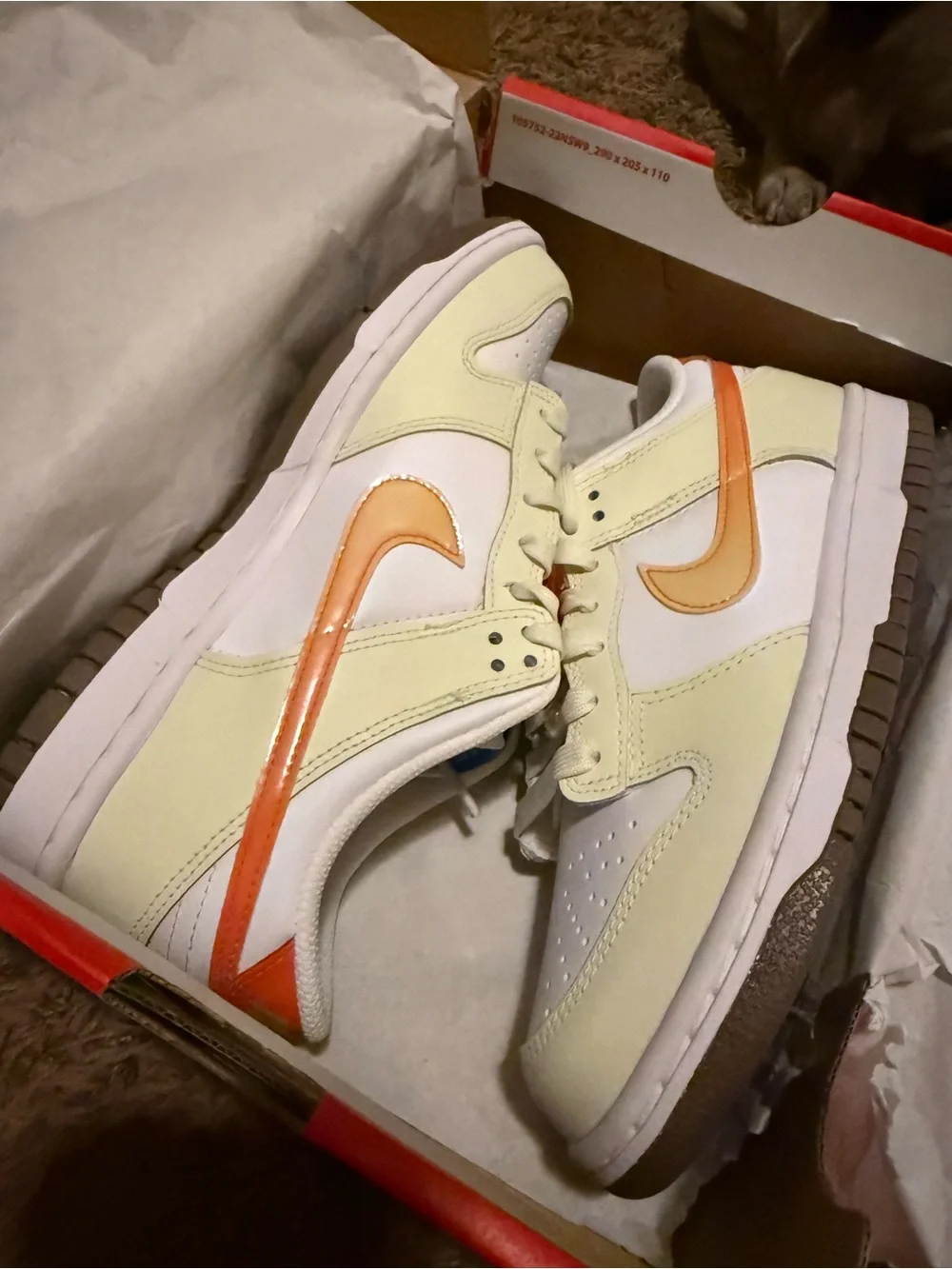 Nike Kids Low-Top Sneakers in Cream with Orange Swoosh